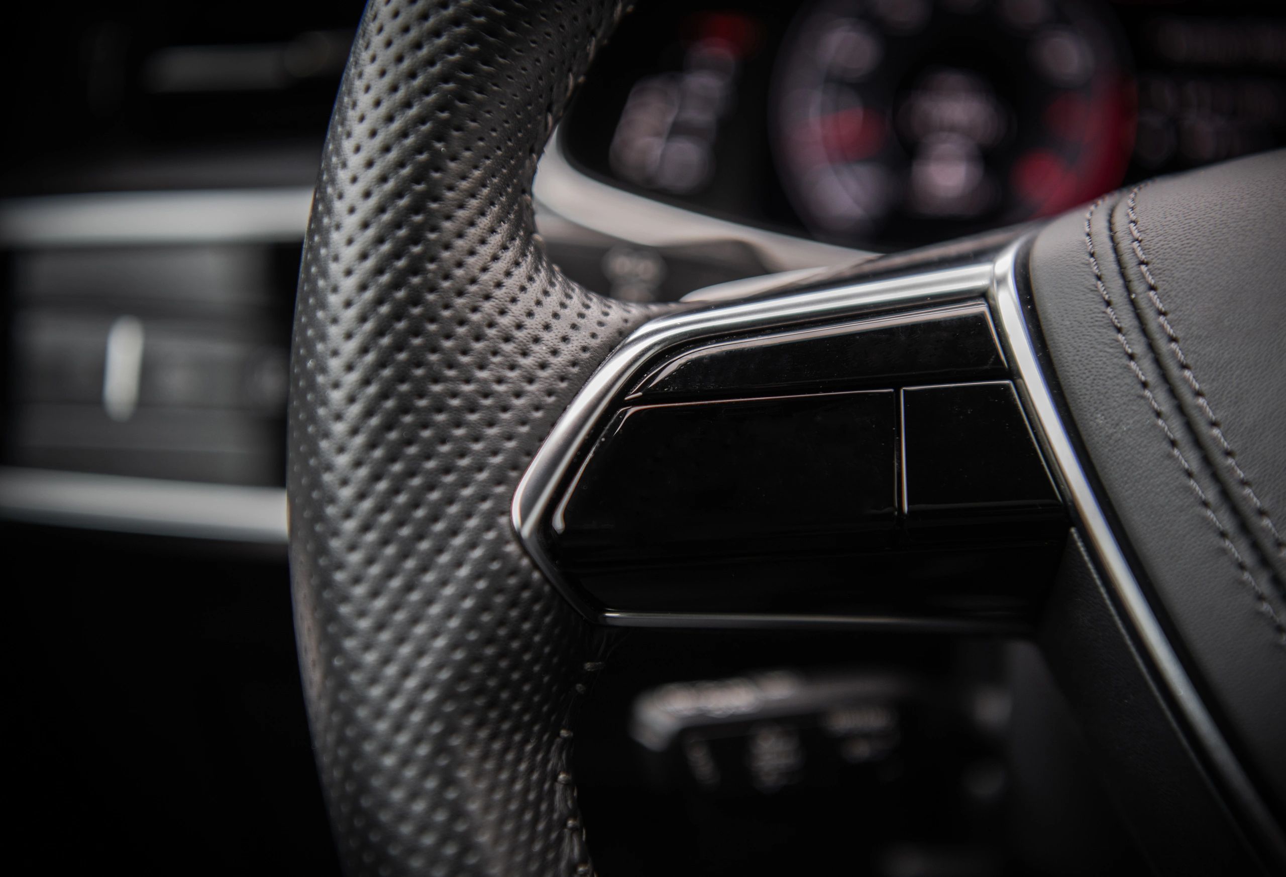 Close-up of a modern performance car steering wheel